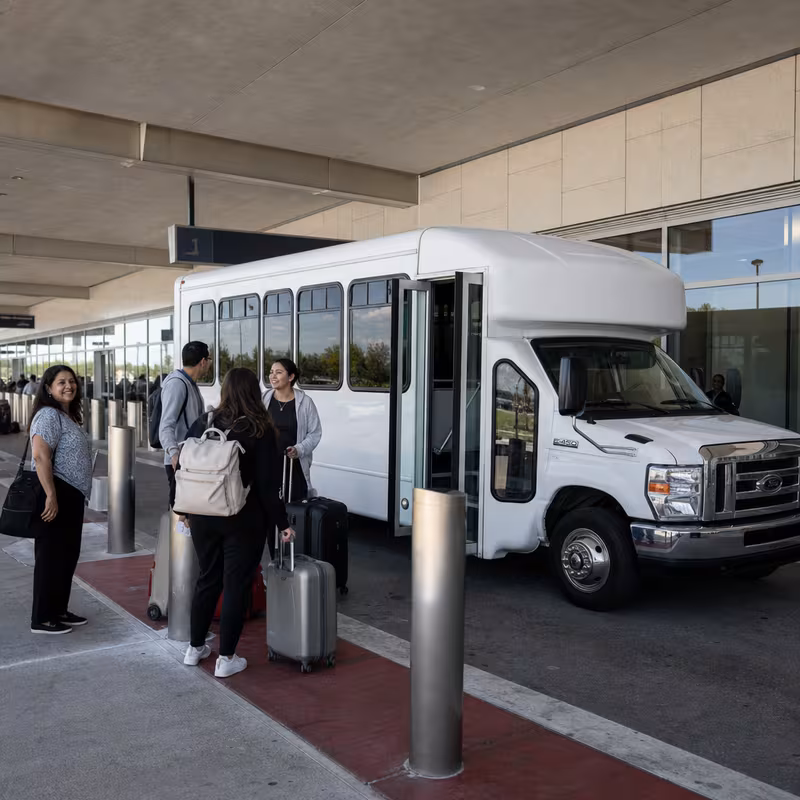 Black Mercedes Sprinter van staged for an Carrollton Airport Transportation group