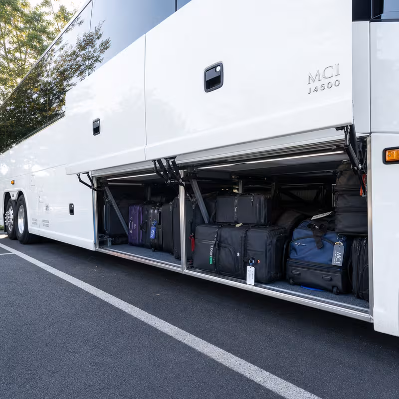 Party bus interior with wraparound leather seating and LED lighting in Carrollton