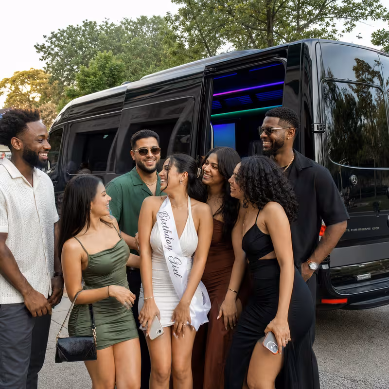 Party bus interior with wraparound leather seating and LED lighting in Carrollton