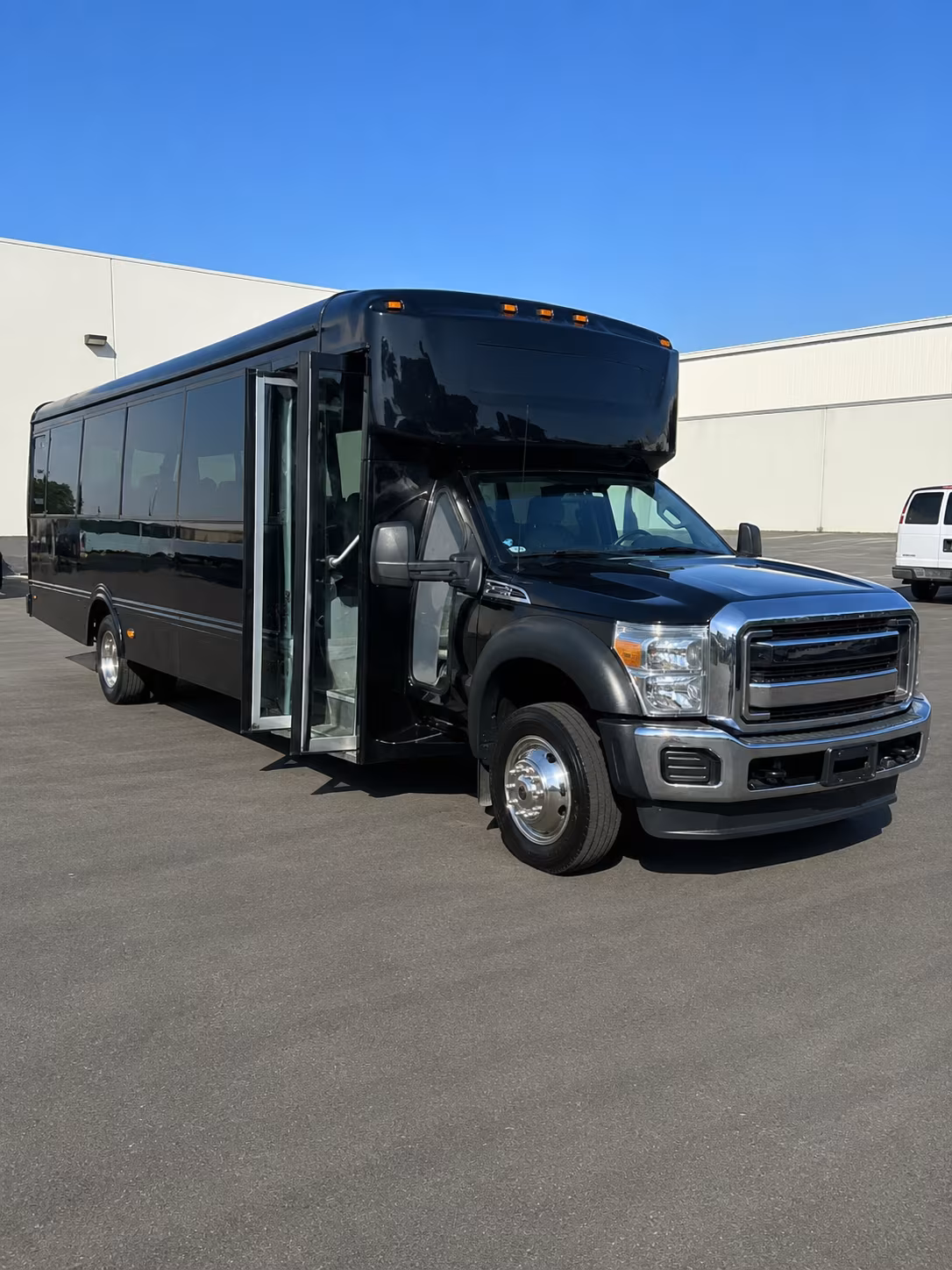 Carrollton Birthday, Sweet 16, & Quinceañera Transportation party bus exterior