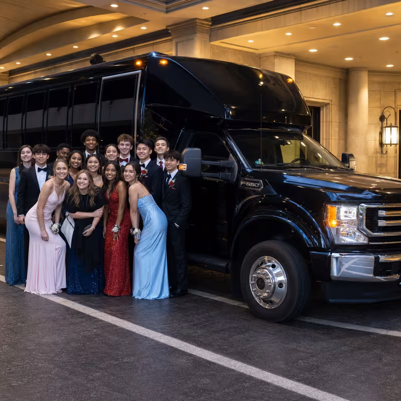 Party bus interior with wraparound leather seating and LED lighting in Carrollton