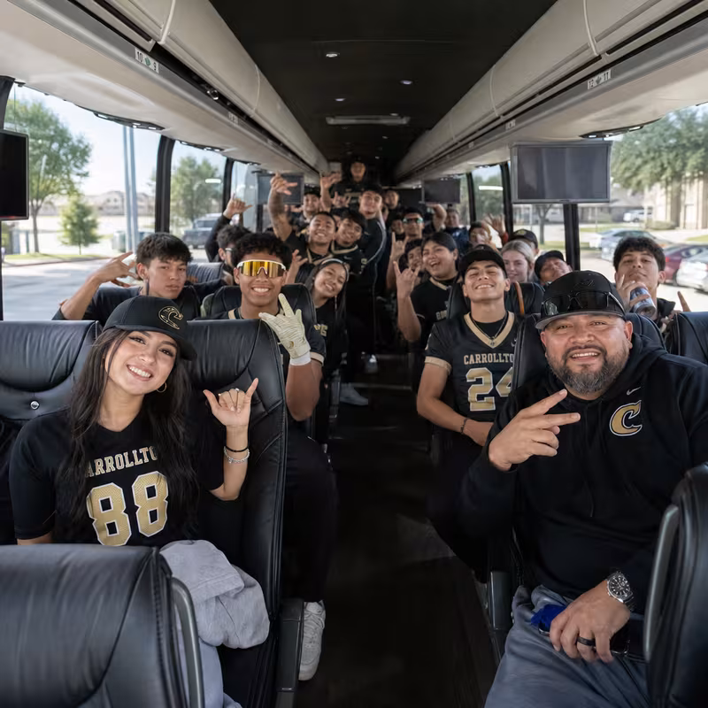 Black Mercedes Sprinter van staged for an Carrollton Sporting Event Transportation group