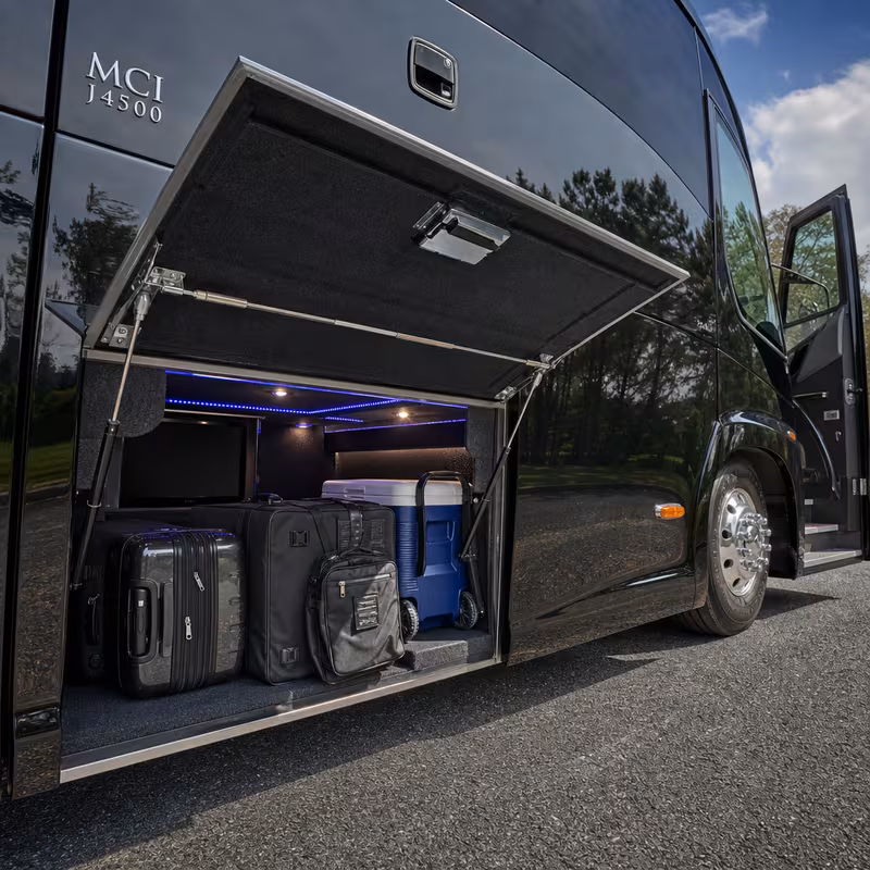 Party bus interior with wraparound leather seating and LED lighting in Carrollton
